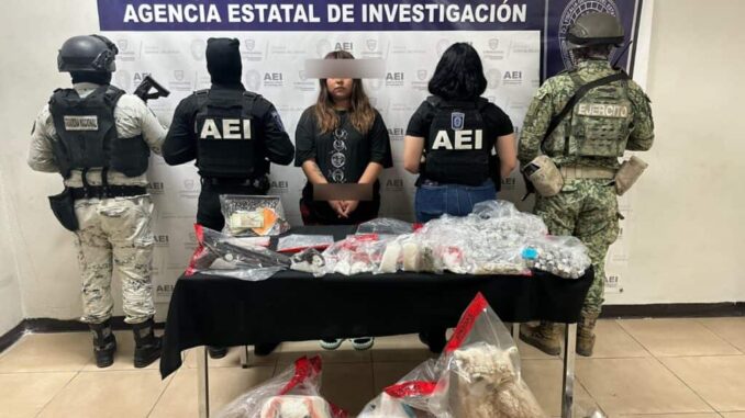detienen-a-mujer-por-posesion-de-drogas-armas-de-fuego-cartuchos-y-dinero.jpg Detienen a mujer por posesión de drogas, armas de fuego, cartuchos y dinero
